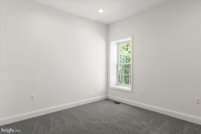 1631 U St SE, Washington, DC 20020 - spare room featuring dark carpet and recessed lighting