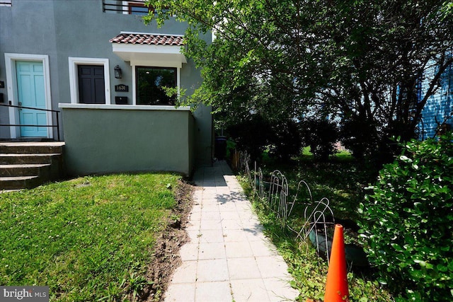 1631 U St SE, Washington, DC 20020 - entrance to property featuring stucco siding and a tiled roof