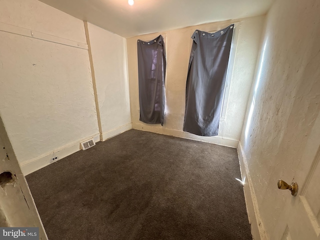 unfurnished bedroom featuring carpet floors