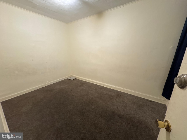 unfurnished room featuring carpet flooring