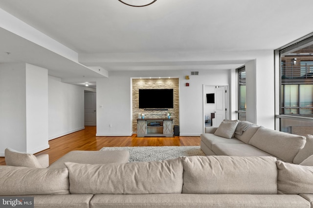 living room with light hardwood / wood-style flooring