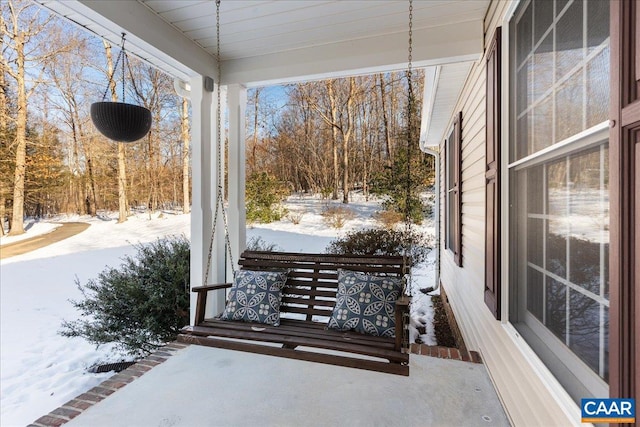 view of snow covered patio