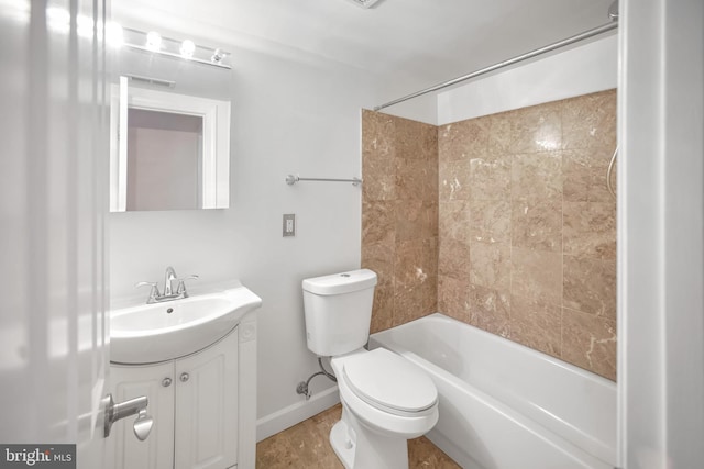 full bathroom with toilet, vanity, and shower / washtub combination