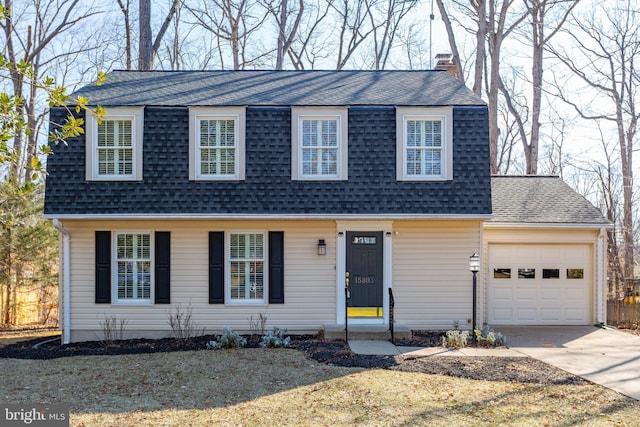 view of front of property with an attached garage, driveway, a shingled roof, and a front lawn