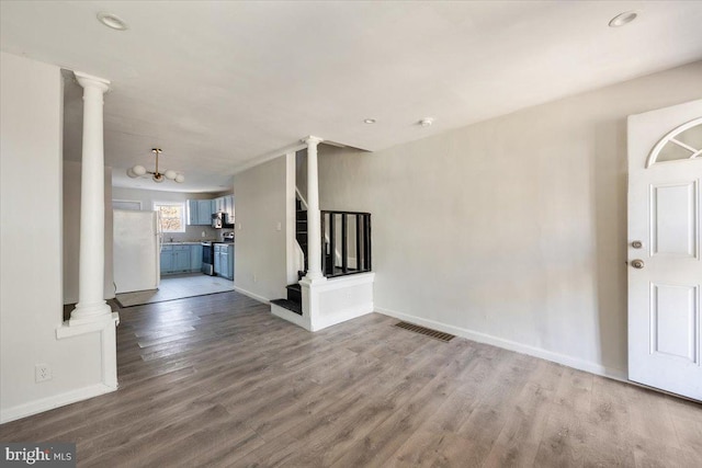 entrance foyer featuring hardwood / wood-style floors