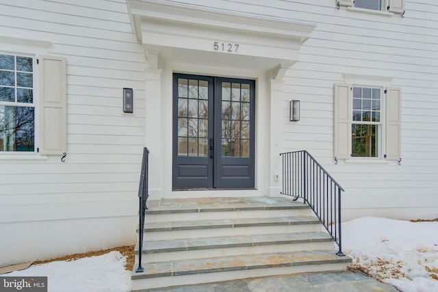 entrance to property featuring french doors