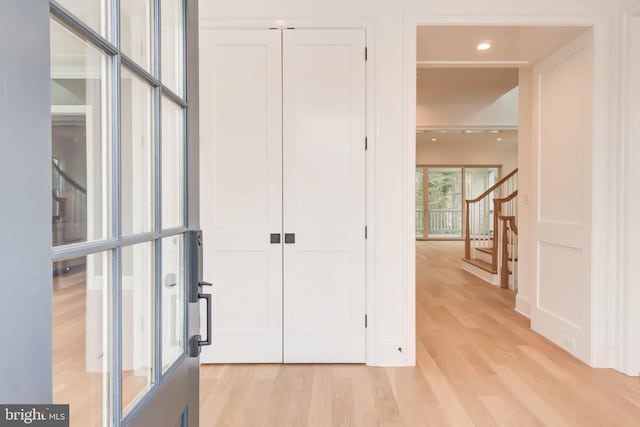 corridor featuring light hardwood / wood-style flooring