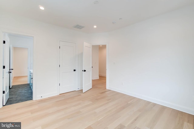 unfurnished bedroom featuring light hardwood / wood-style floors