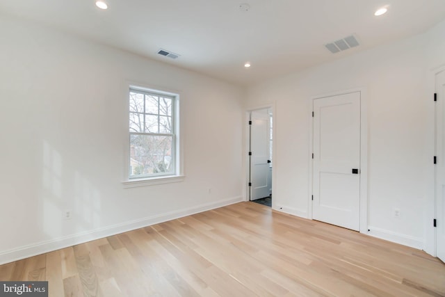 unfurnished bedroom featuring light hardwood / wood-style flooring