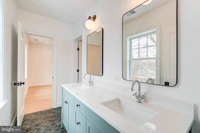 bathroom featuring vanity and tile patterned flooring