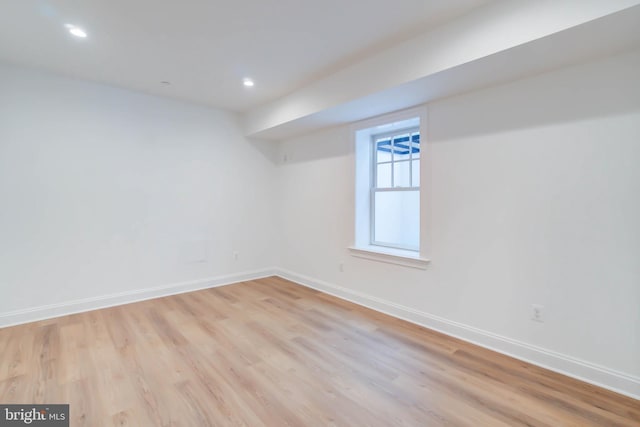 unfurnished room featuring light hardwood / wood-style floors