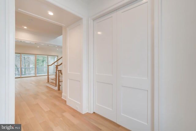 corridor featuring light wood-type flooring