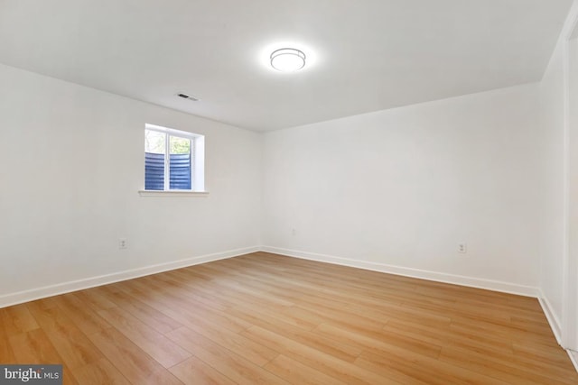 unfurnished room featuring light wood-type flooring