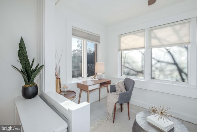 sitting room with light tile patterned floors