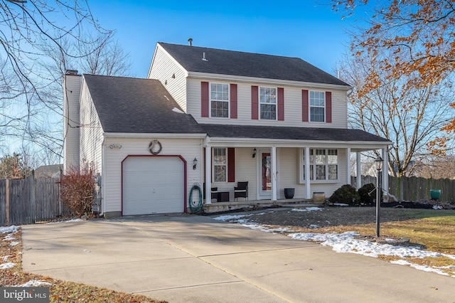 view of front of house featuring a porch and a garage