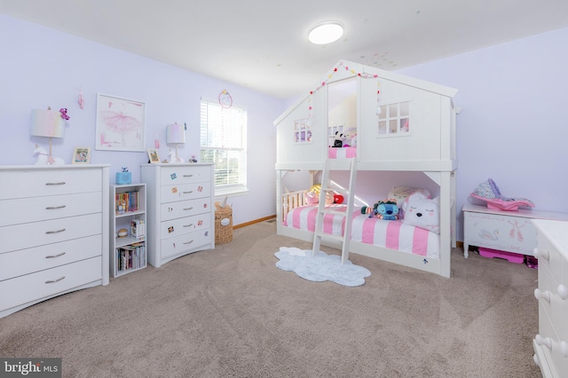 bedroom with light carpet