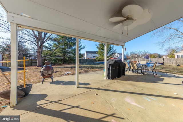 view of patio / terrace with ceiling fan and area for grilling