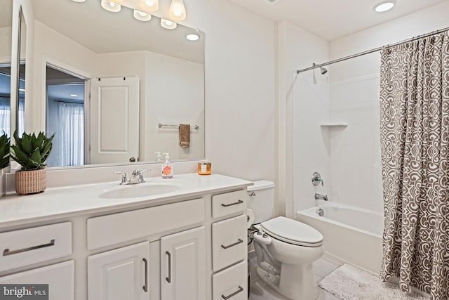 full bathroom featuring vanity, toilet, and shower / bath combo