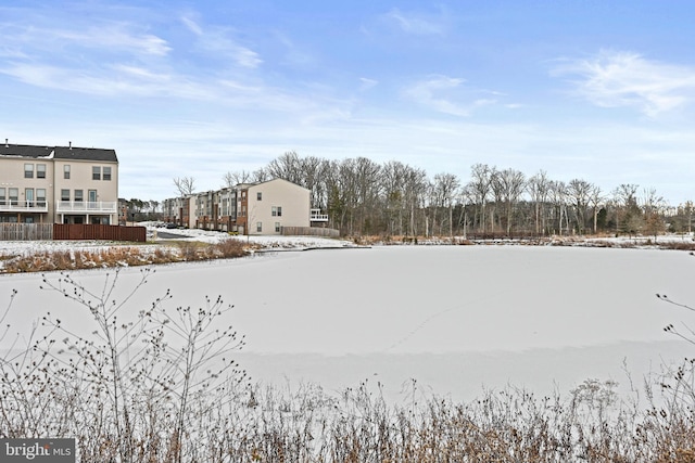 view of yard covered in snow