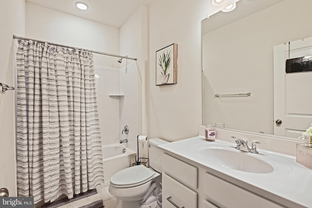 full bathroom with vanity, shower / bath combination with curtain, and toilet