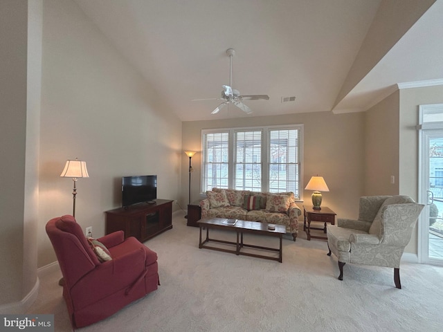 living room with light carpet and a wealth of natural light