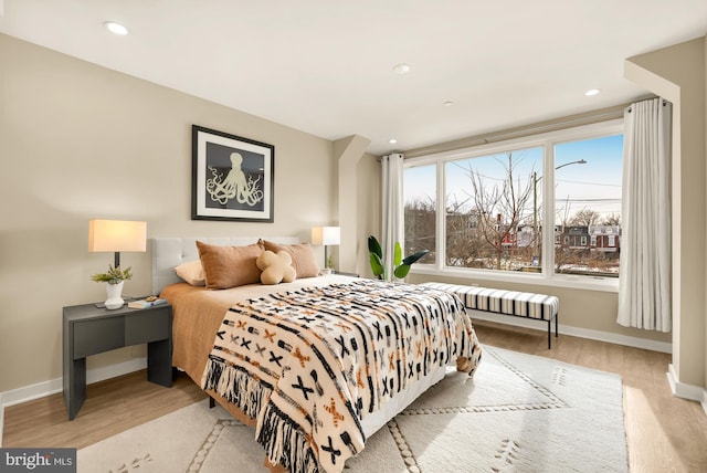 bedroom featuring light hardwood / wood-style floors