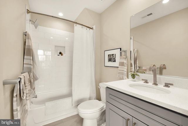 full bathroom featuring toilet, shower / tub combo, tile patterned flooring, and vanity