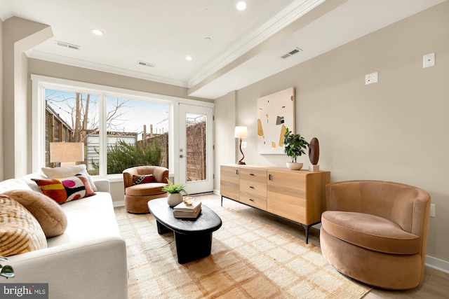 sitting room featuring ornamental molding