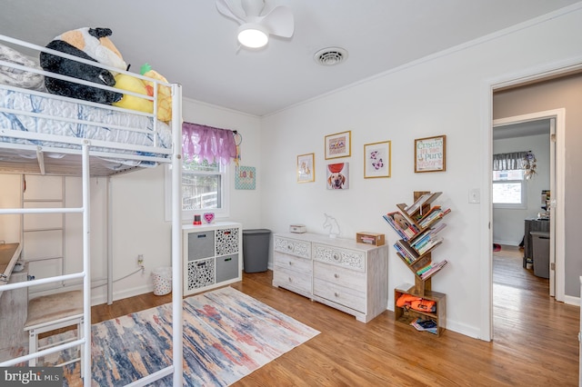 bedroom with hardwood / wood-style flooring