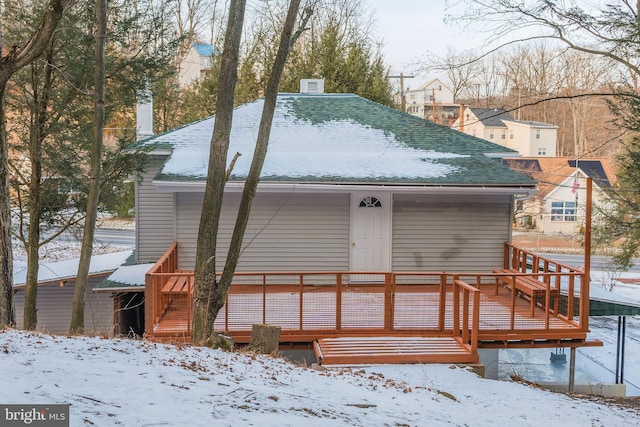 view of snow covered property