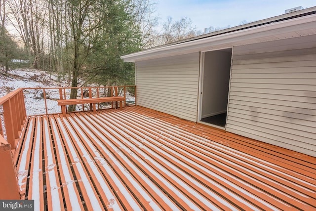 view of snow covered deck