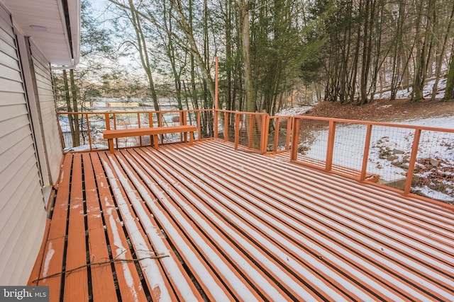 view of snow covered deck