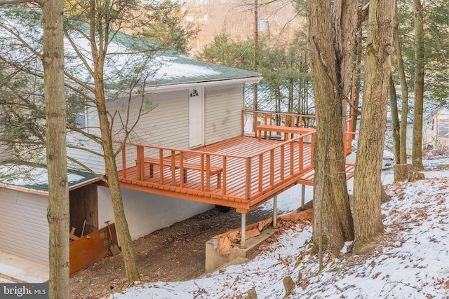 view of snow covered deck