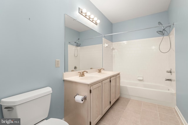 full bathroom featuring toilet, tile patterned flooring, tiled shower / bath combo, and vanity