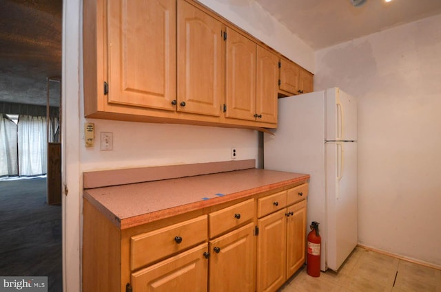 kitchen with white refrigerator