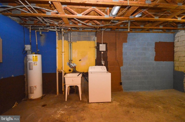 basement with washer / dryer and water heater