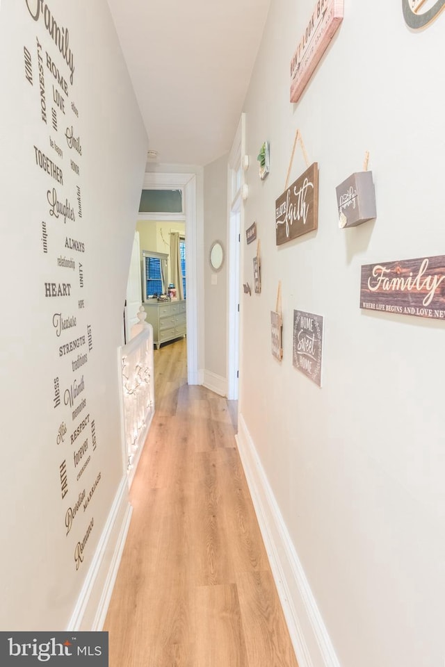 hallway featuring light hardwood / wood-style flooring