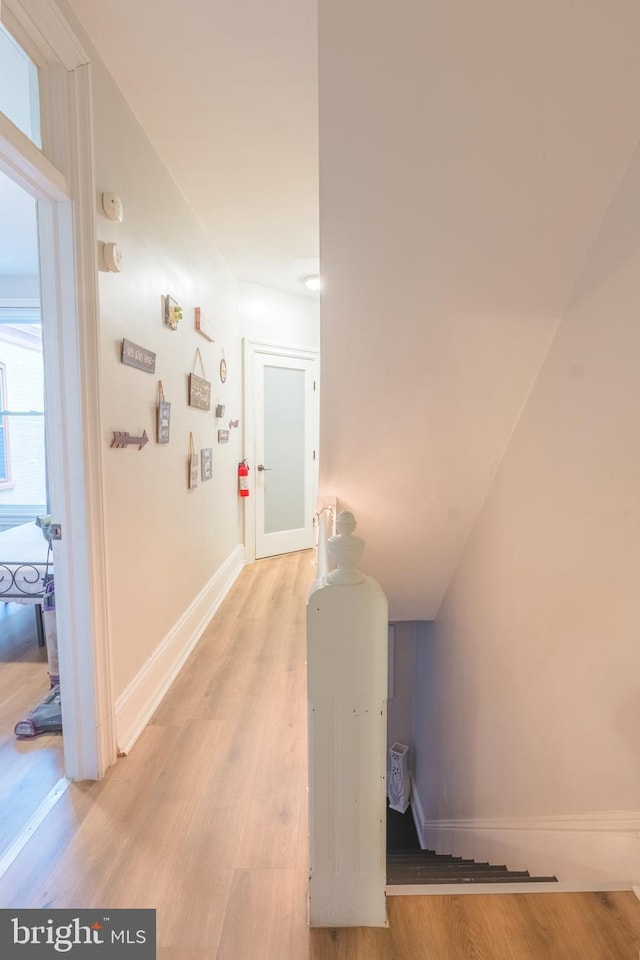 corridor featuring light wood-type flooring