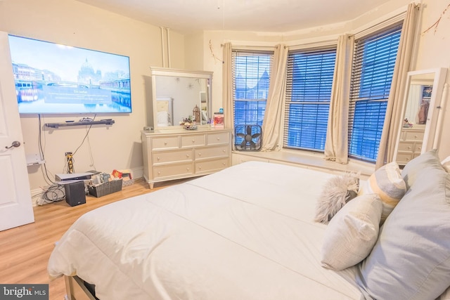 bedroom featuring light hardwood / wood-style flooring