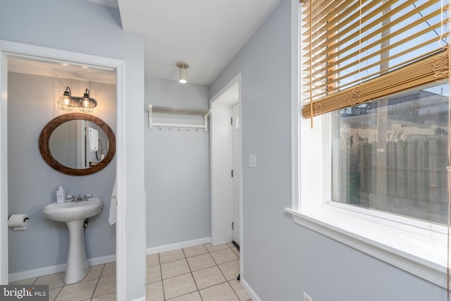 bathroom with tile patterned floors