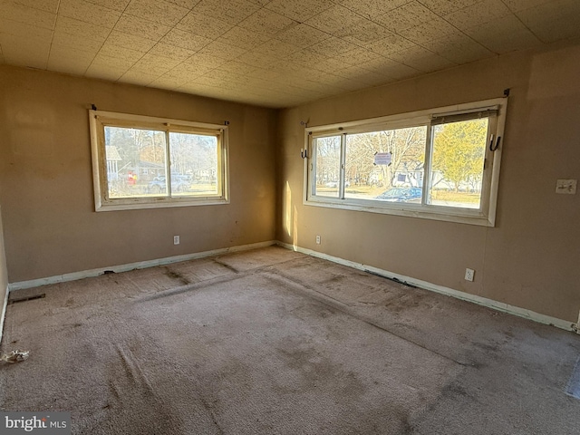 view of carpeted spare room