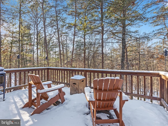 view of snow covered deck