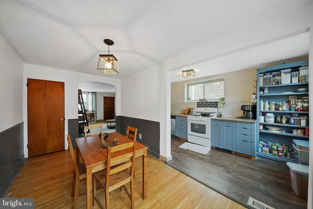 dining area with light hardwood / wood-style flooring