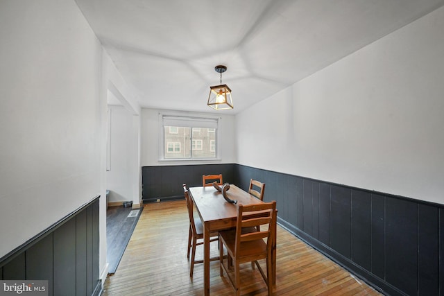 dining room with light hardwood / wood-style floors