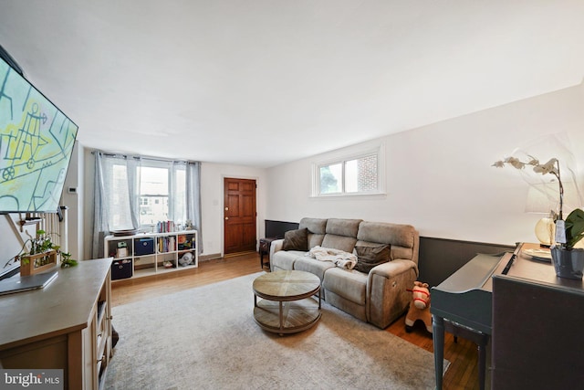 living room with light hardwood / wood-style floors