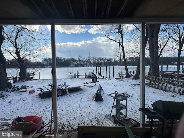 view of yard layered in snow