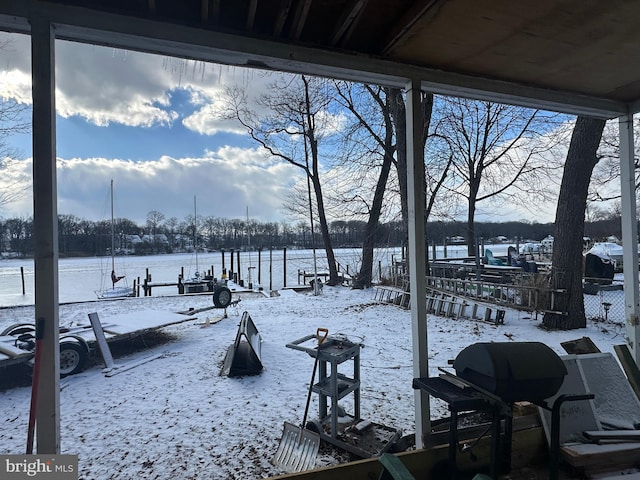 view of yard layered in snow