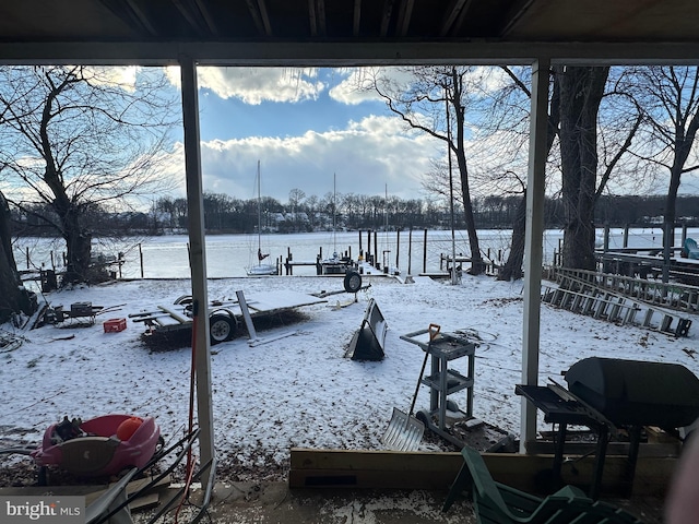 view of yard covered in snow