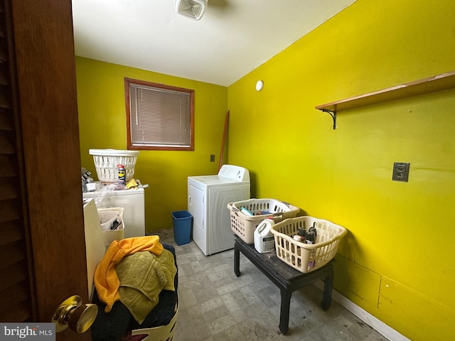 washroom with washer and clothes dryer