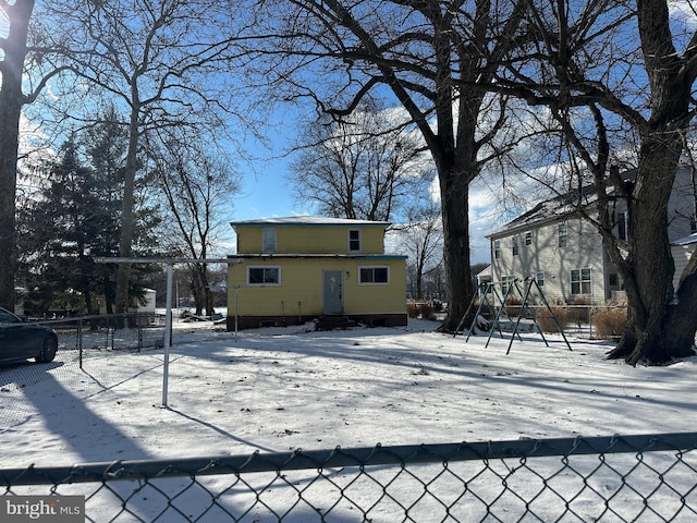 view of snow covered house